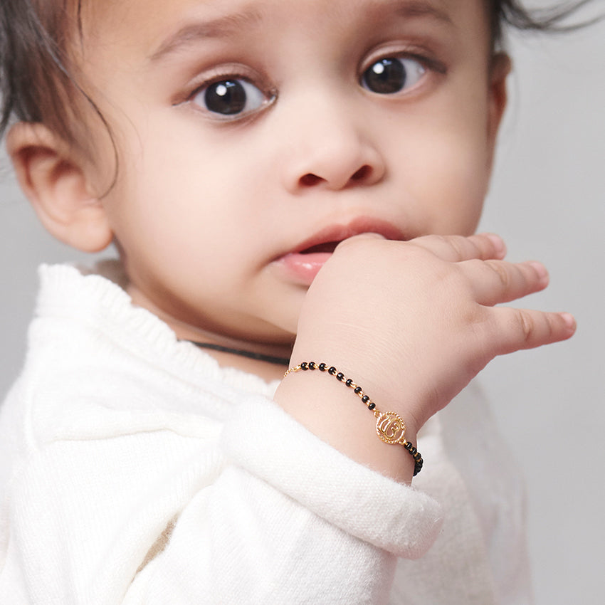 Gold Omkar Baby Bracelet